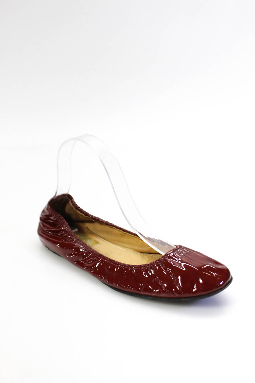 red patent flat shoes