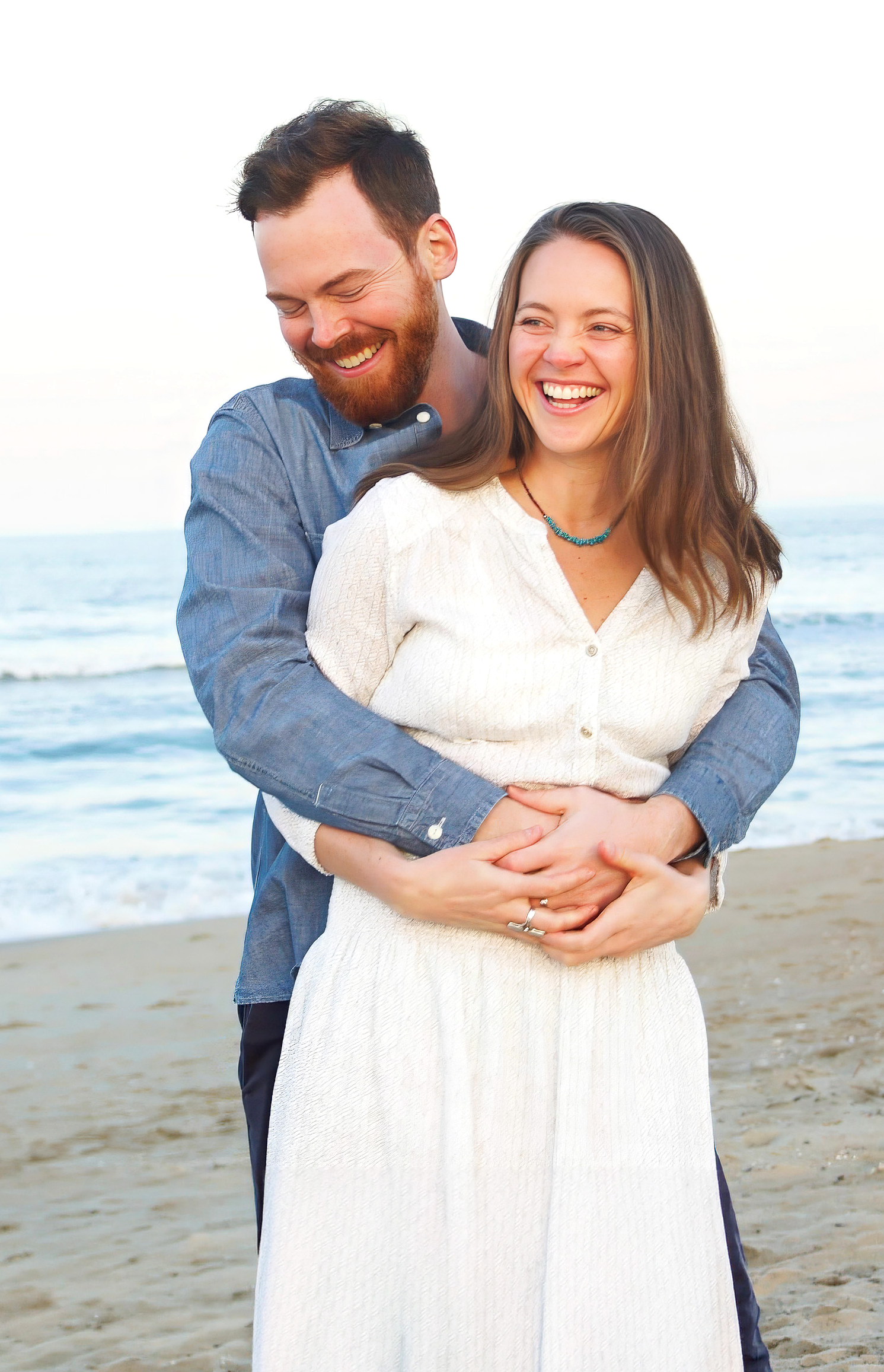 Candid couple portrait on the beach