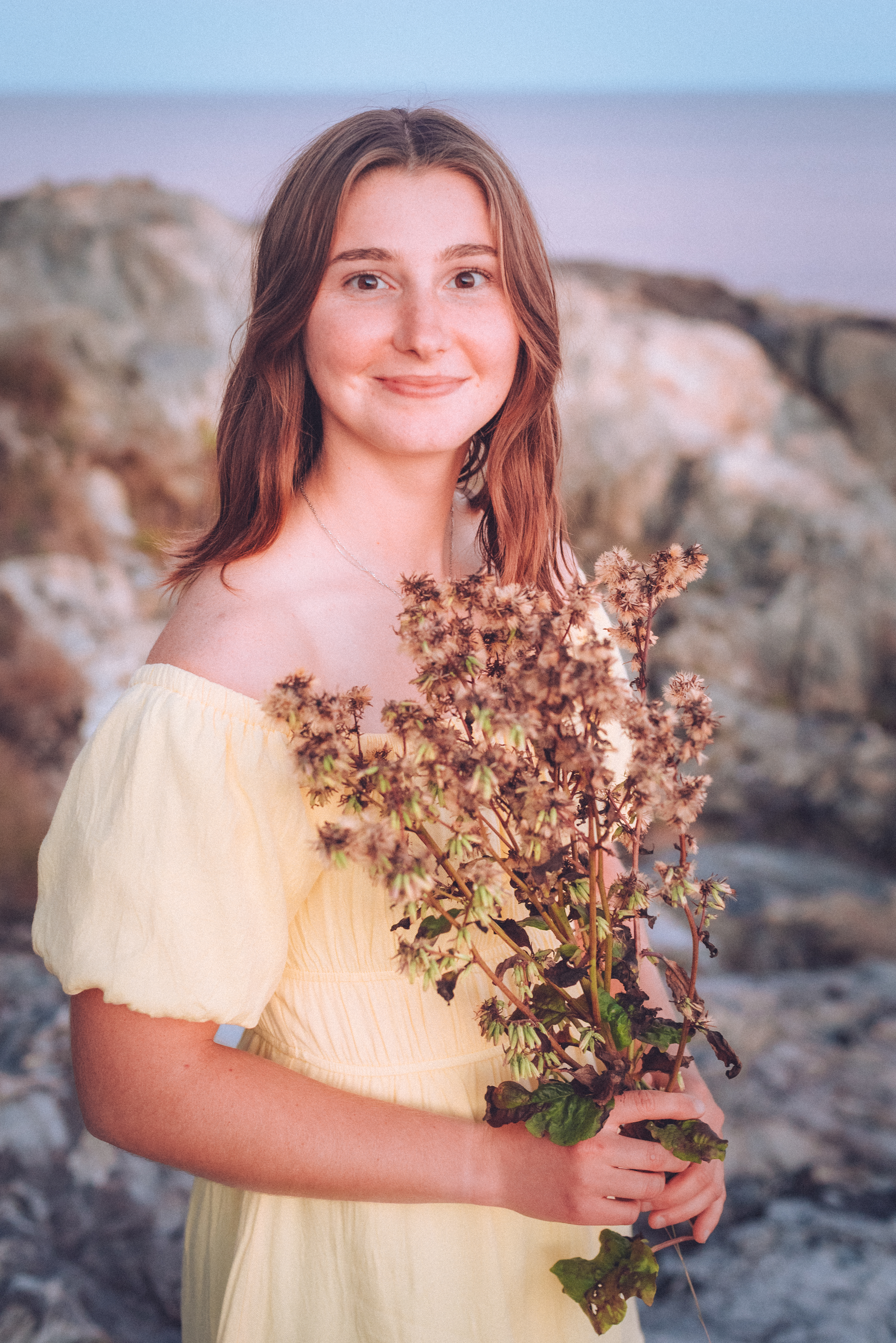 Portrait of Karli at Otter Point in Acadia National Park, Maine, photographed by Among the Grain Photography