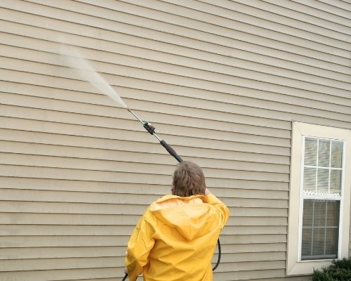 Why is it important to hire professionals for pressure cleaning?