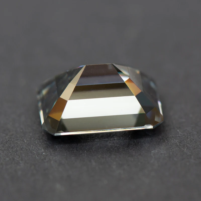 https://filedn.com/lbDn48ArIEU8tstyEOW46uV/4sale/Moissanite%20Loose%20Stones%20/Charming%20Gemstone%20Store-Ghost-Gray-Emerald-Cut-1-5-Carats-2.webp