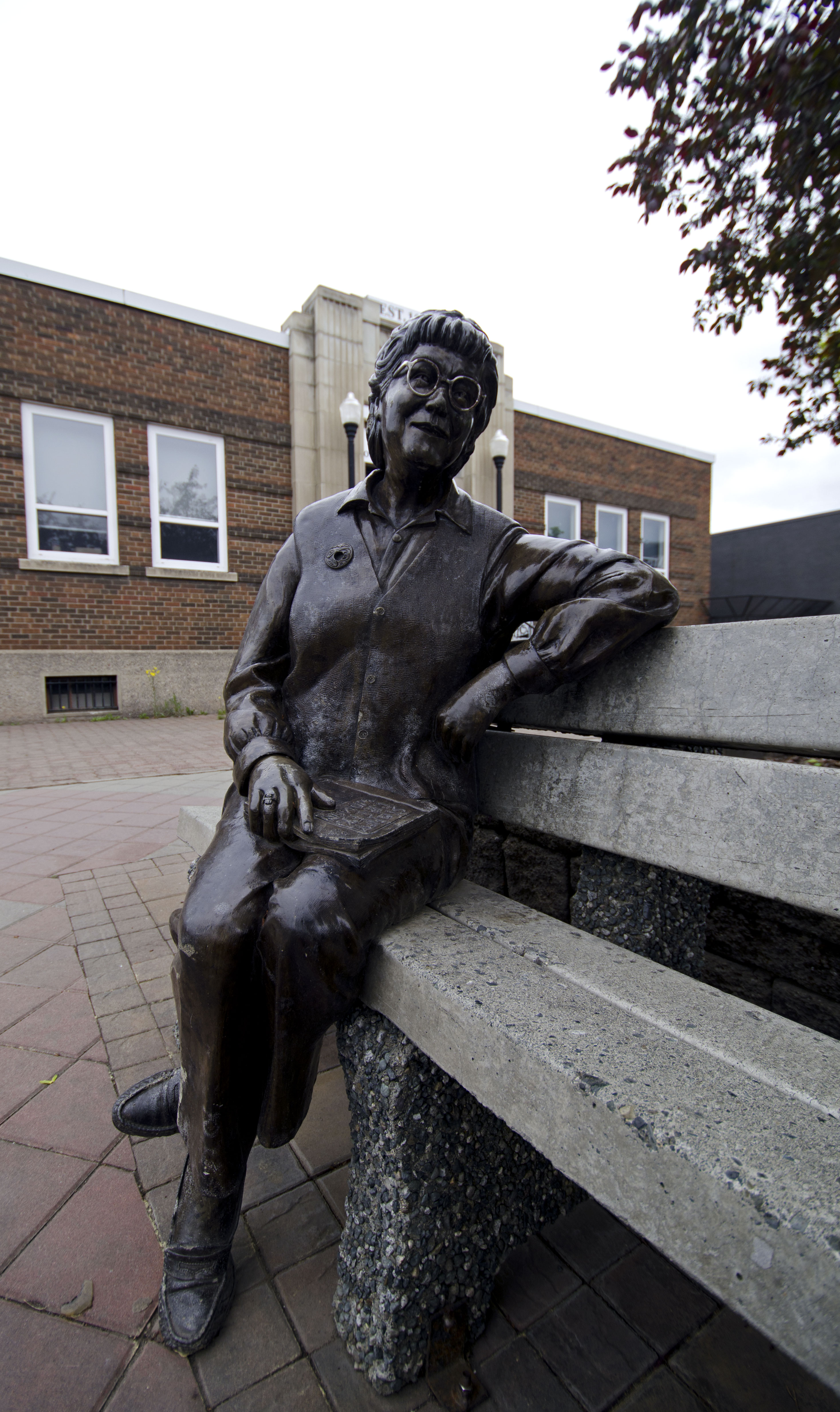 "Bronze statue of Bridget Moran sitting on a bench in Prince George, BC"