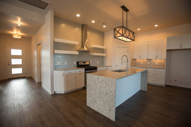 What is the importance of using non-abrasive cleaners on white quartz countertops?